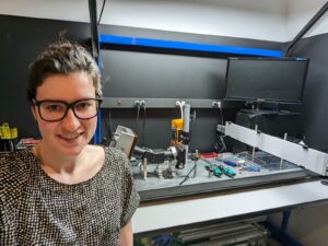 Danielle with PPO's patented spectrometer in optics lab